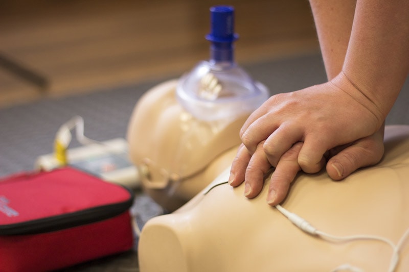 man-giving-CPR-to-dummy