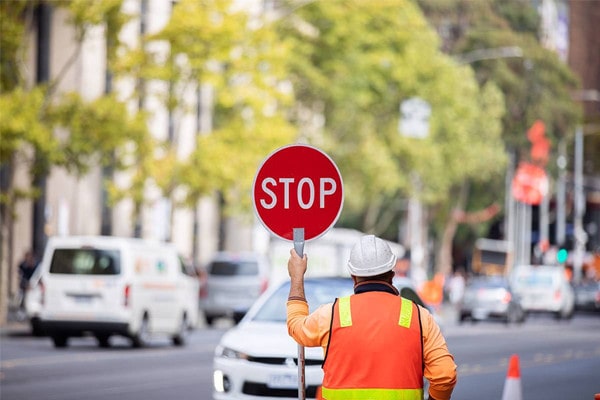 Traffic controller with stop slow sign